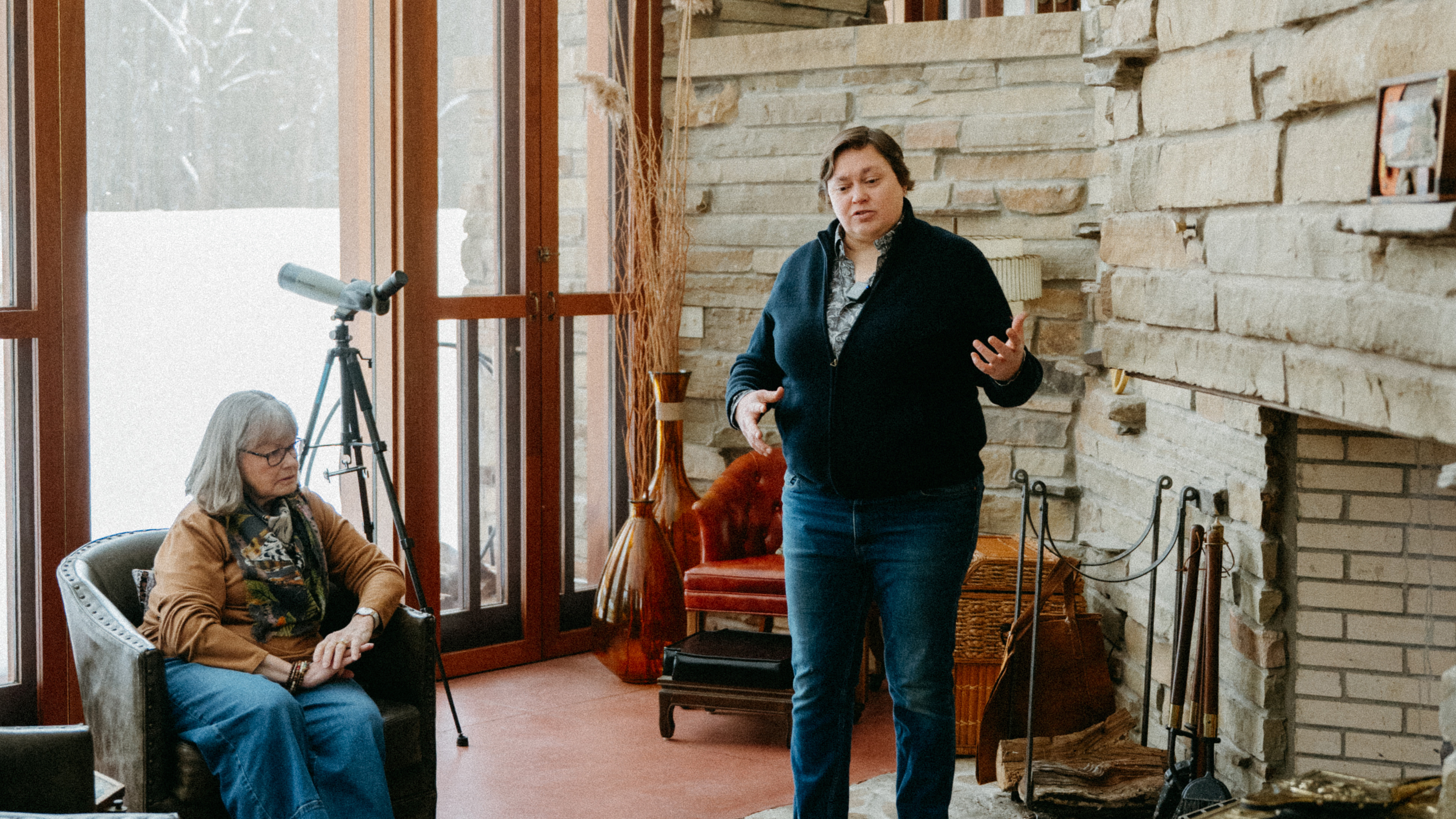 The living room is centered around a fireplace. | Photographed by Suzuran Photography