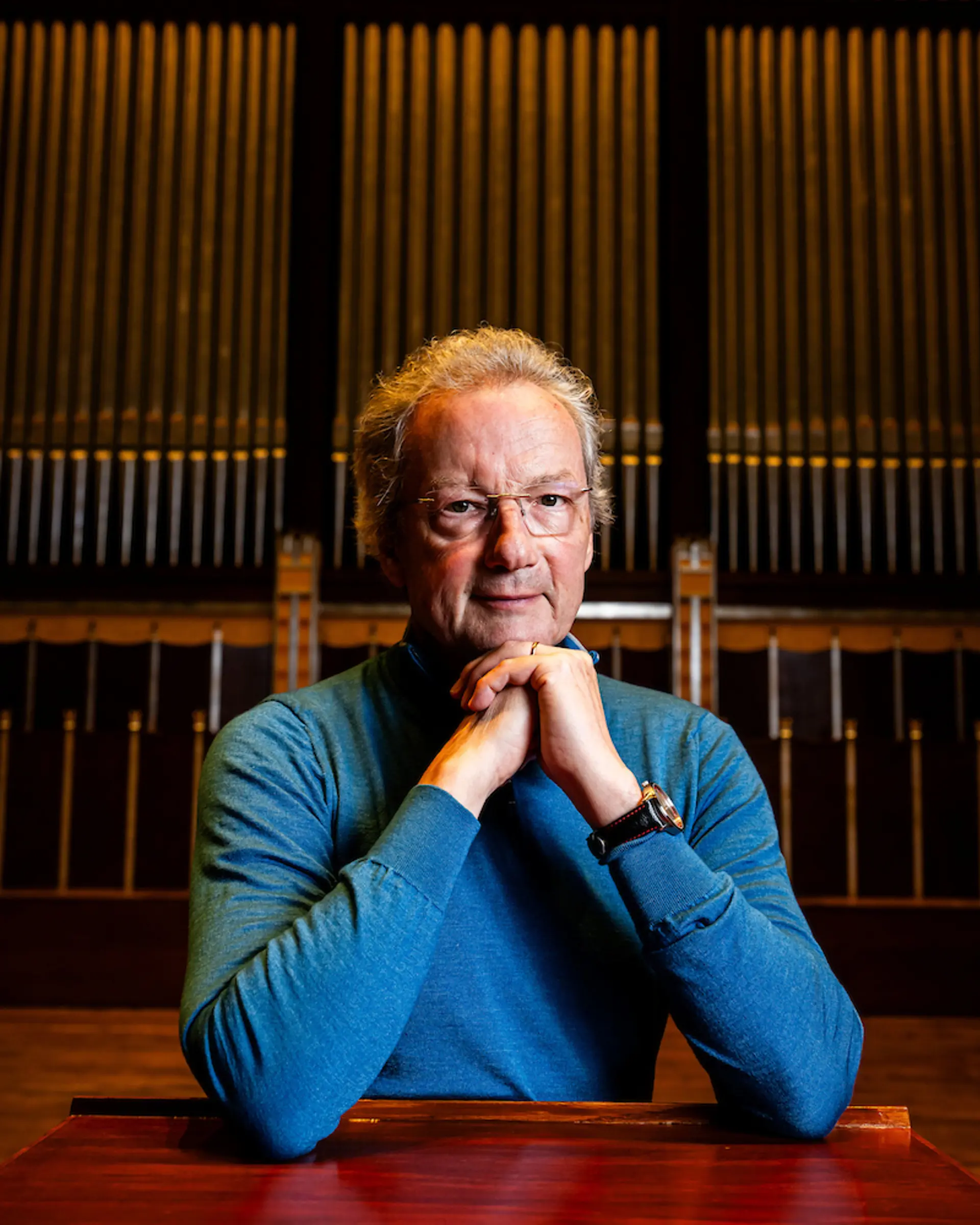 Franz Welser Most standing inside Severance Music Center