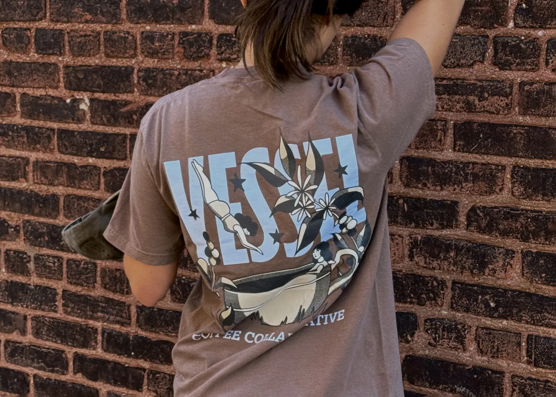 brown Vessel Coffee Collaborative T-shirt with blue writing