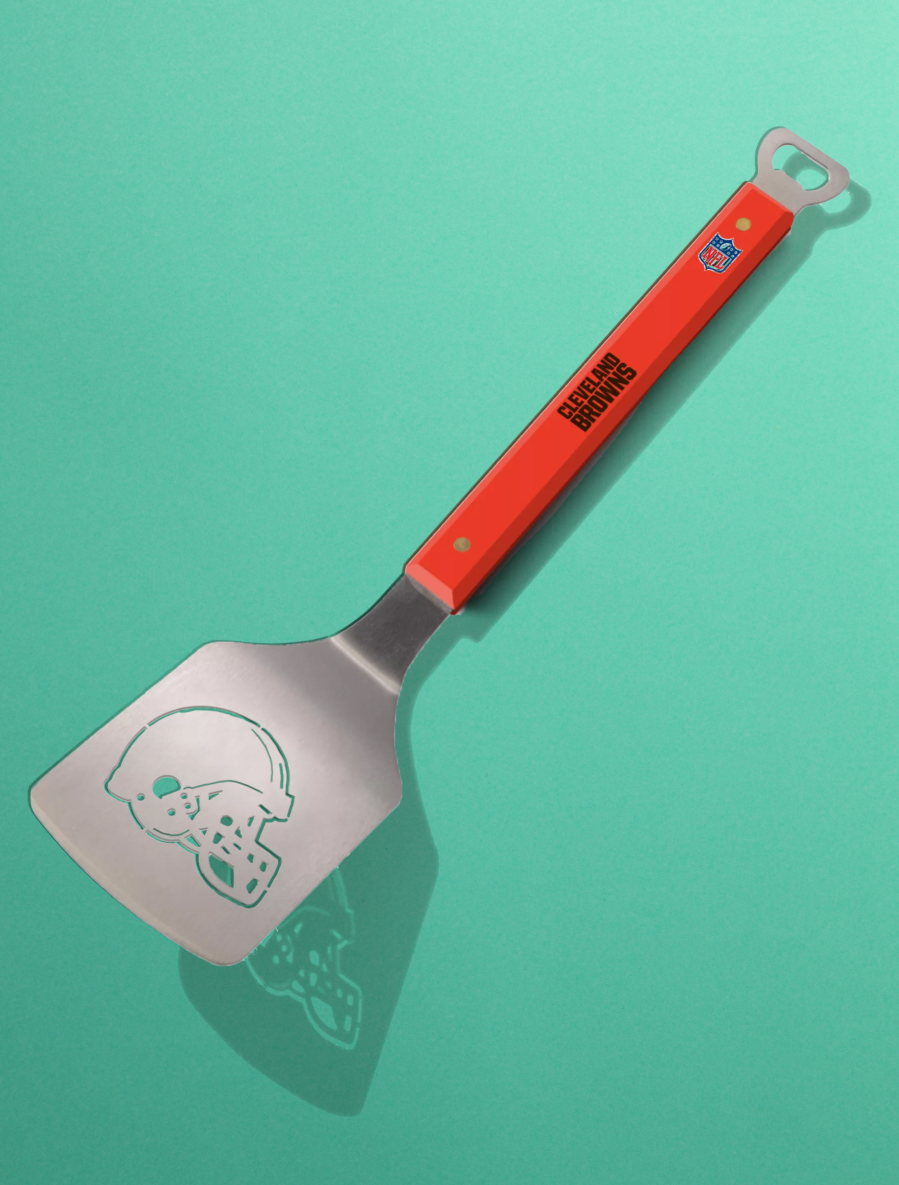 spatula with Cleveland Browns logo on a green background