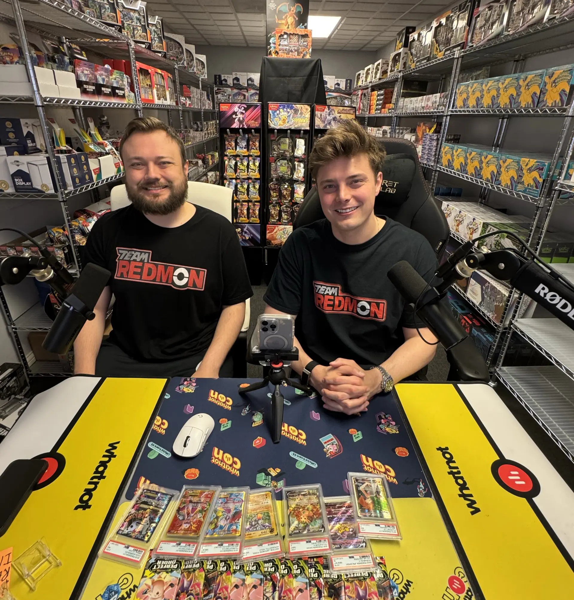 Brian and Cameron Redmon of The Redmon Brothers with Pokemon cards.