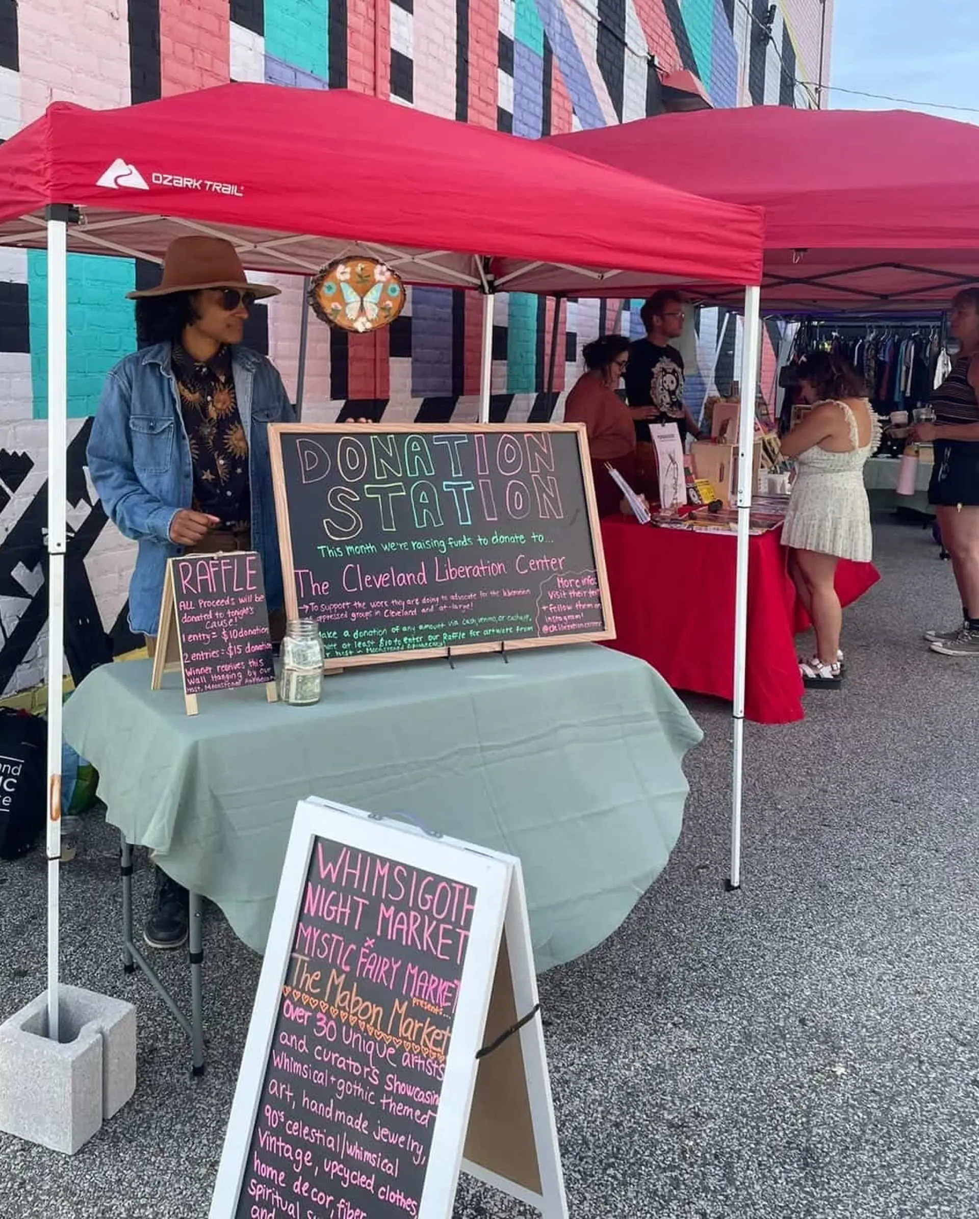 fundraising booth at WhimsiGoth Night Market