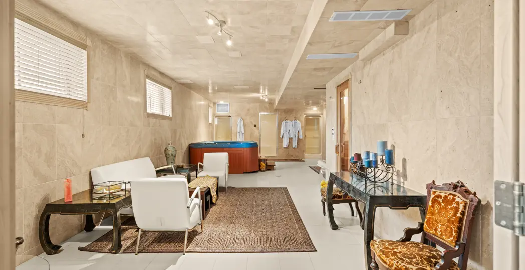 lower level spa with showers and hot tub
