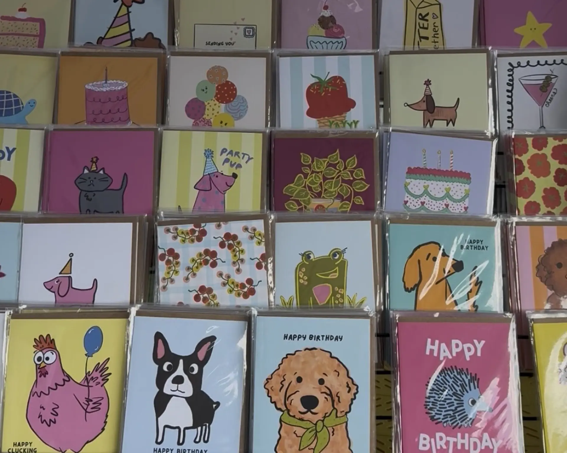 greeting cards on a display shelf