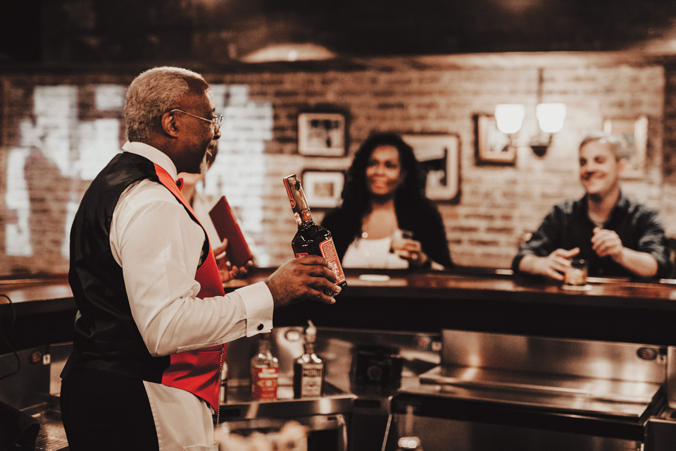 Man bartending at The Ideal Bartender Experience in Louisville, Kentucky (photo by Crystal Ludwick Photo) Man bartending at The Ideal Bartender Experience in Louisville, Kentucky (photo by Crystal Ludwick Photo)