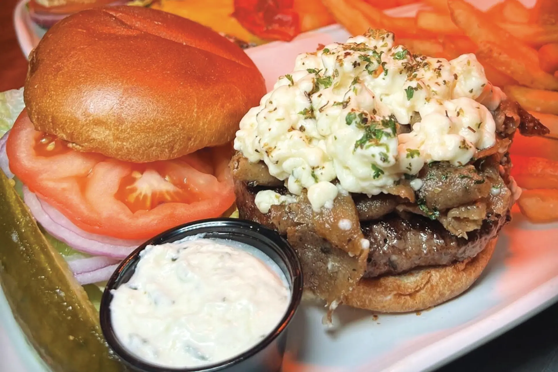 a plate with a burger and fries