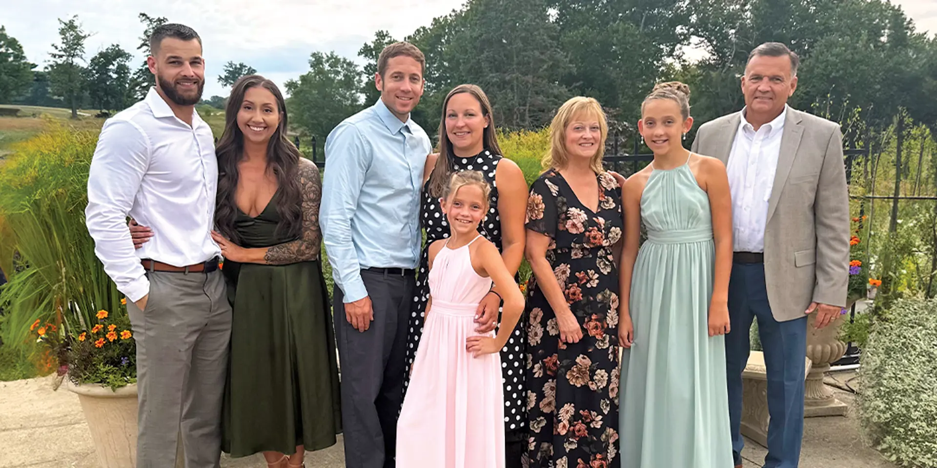 A family smiling for a group photo