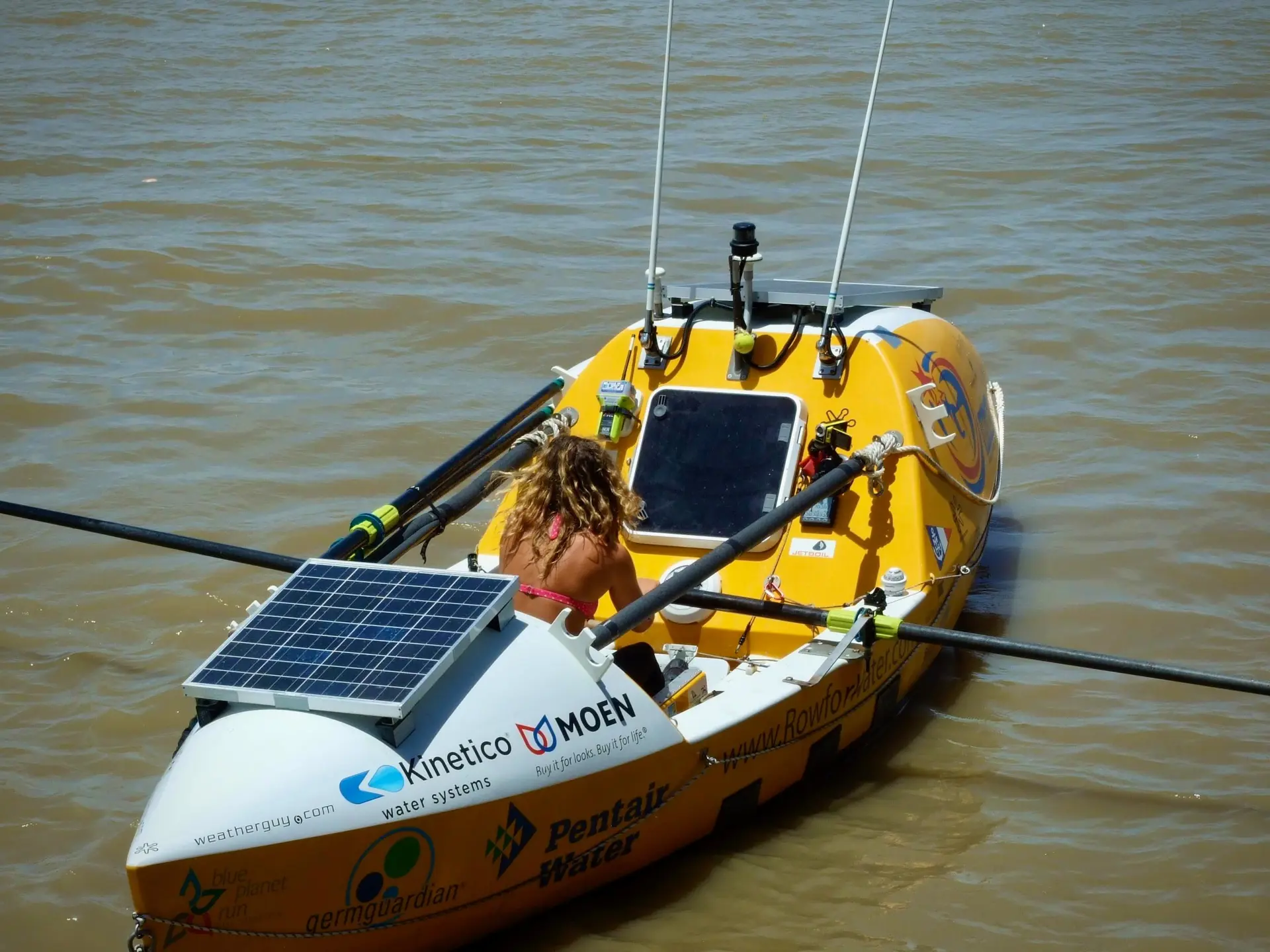 Person rowing in a boat.