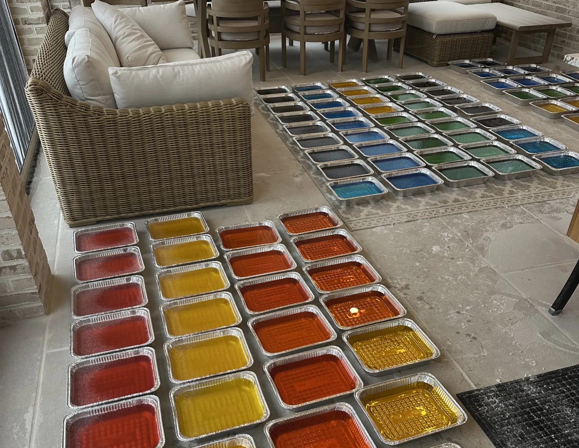 Trays filled with dyed water. 