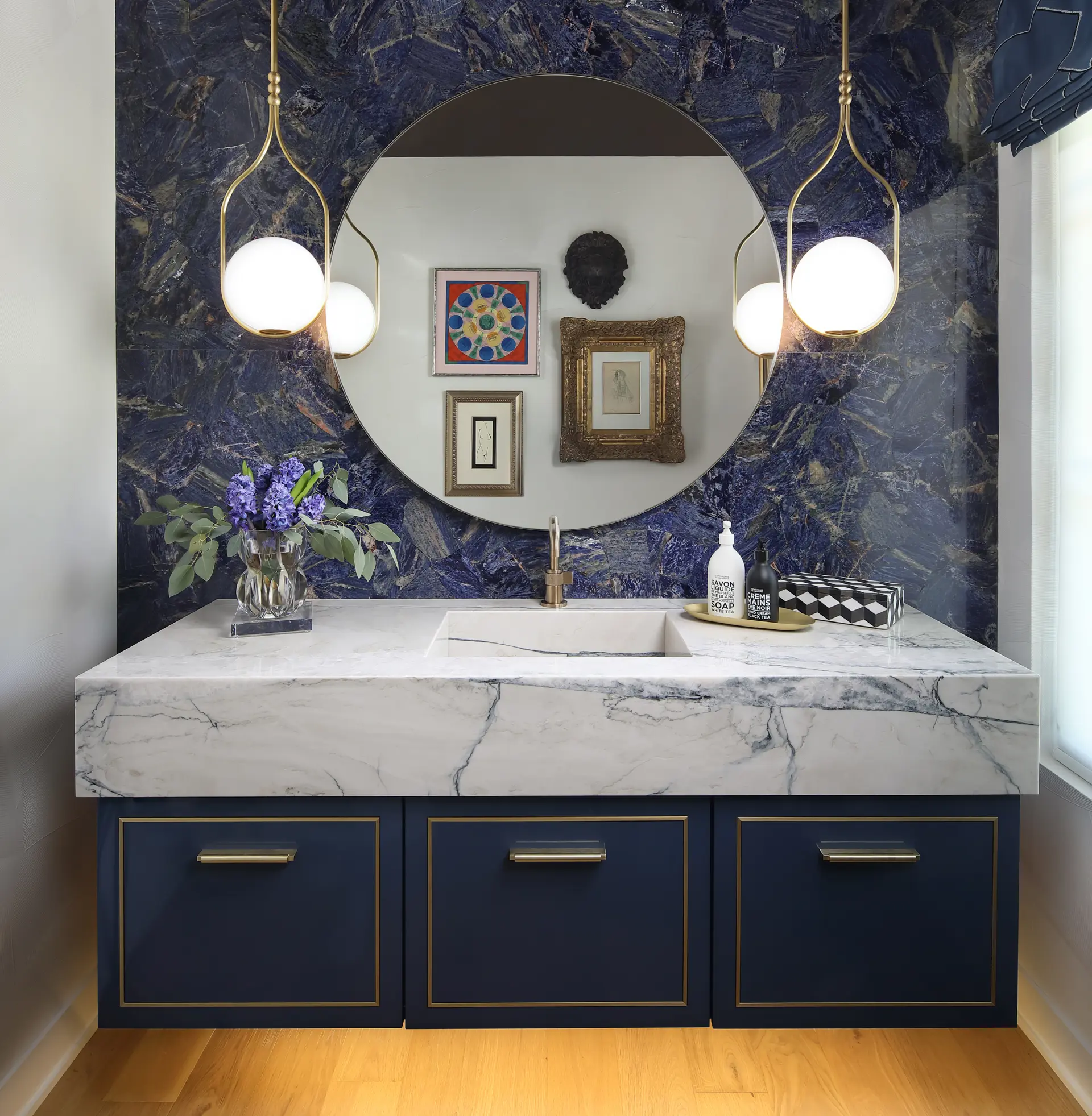 powder room with marble wall