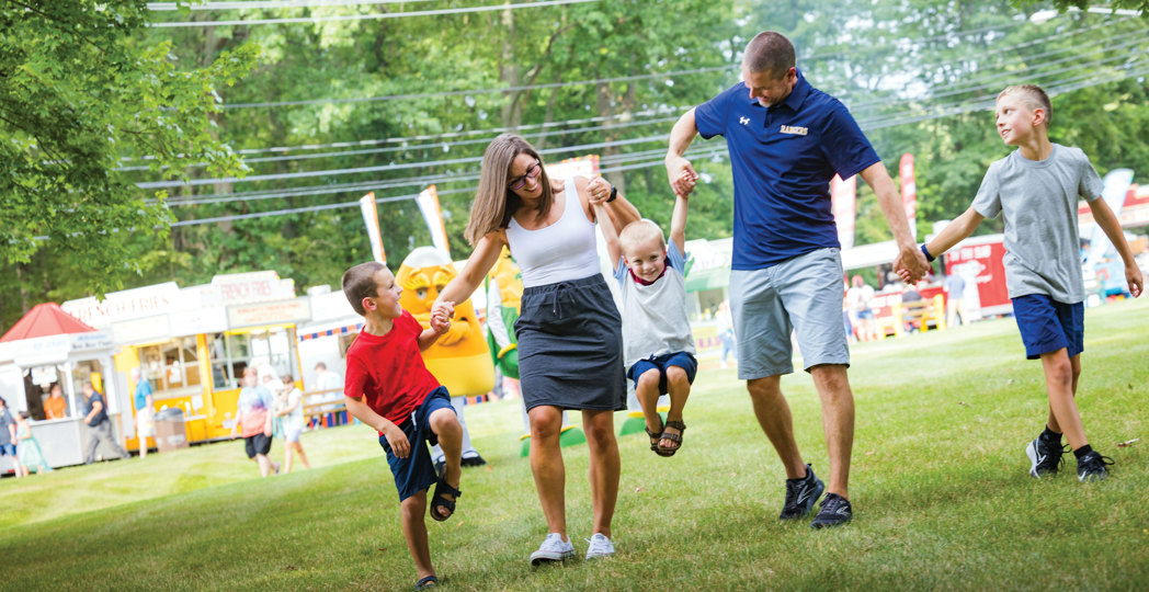 A family enjoying the North Ridgeville Corn Festival