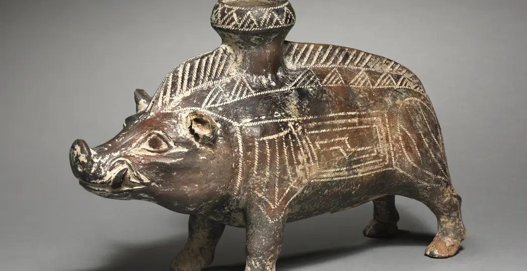 Vessel in the Shape of a Wild Boar, 700–500 BCE or 1900s CE. Italy, Etruscan or modern forgery. Terracotta; overall: 17.5 cm (6 7/8 in.). The Cleveland Museum of Art, Norman O. Stone and Ella A. Stone Memorial Fund, 1977.42