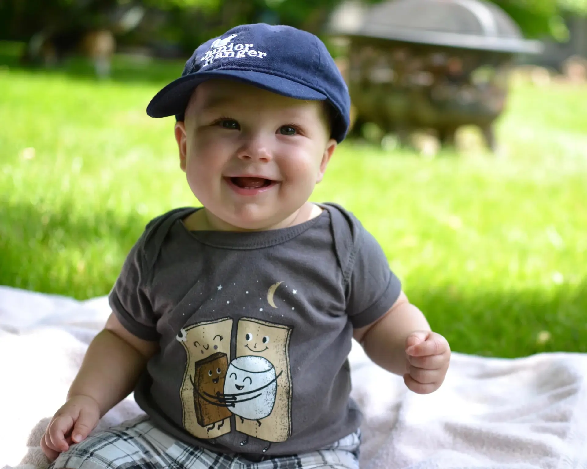baby in s'mores-themed onesie