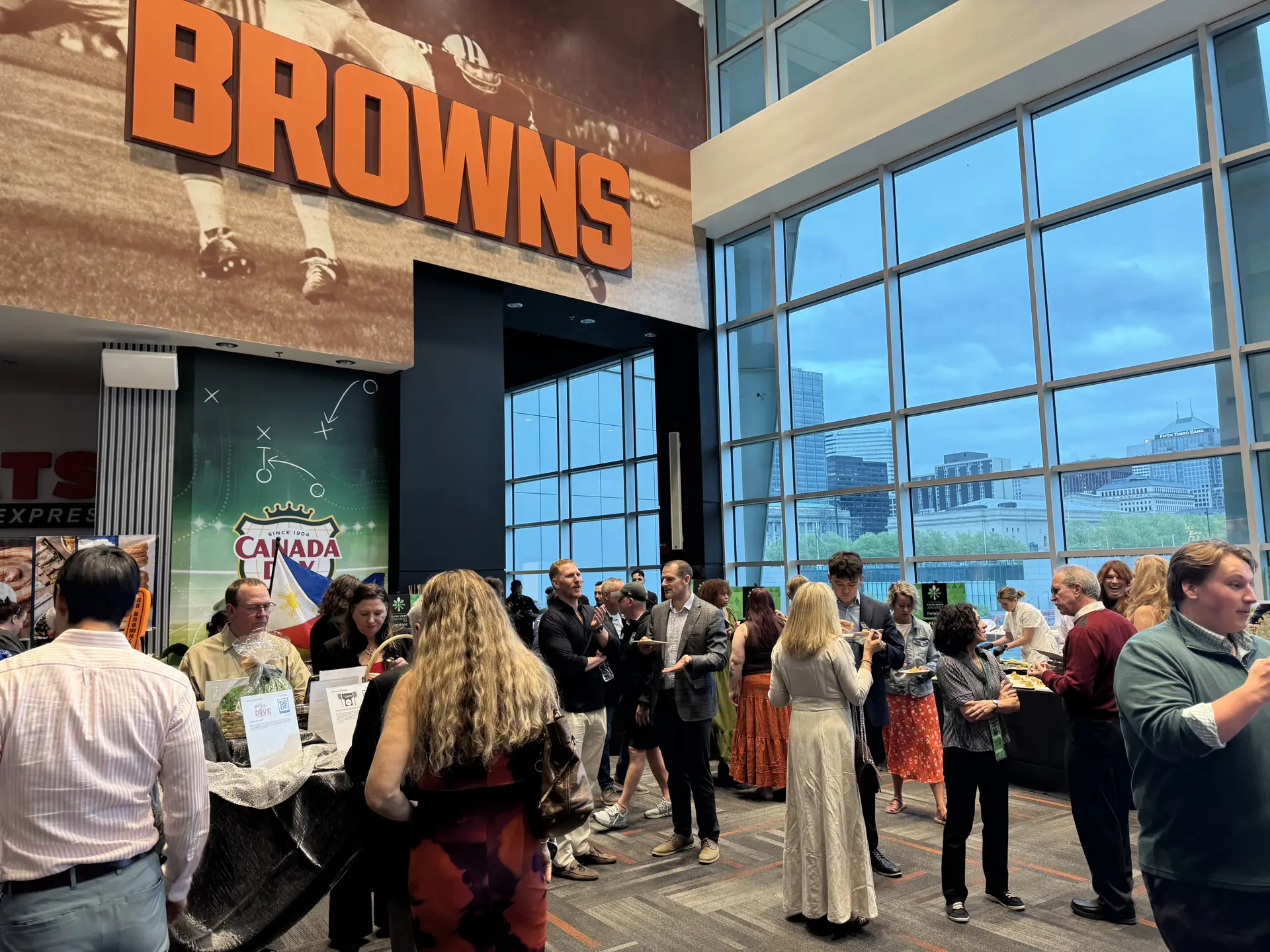 people eating and mingling at the Cleveland Browns stadium