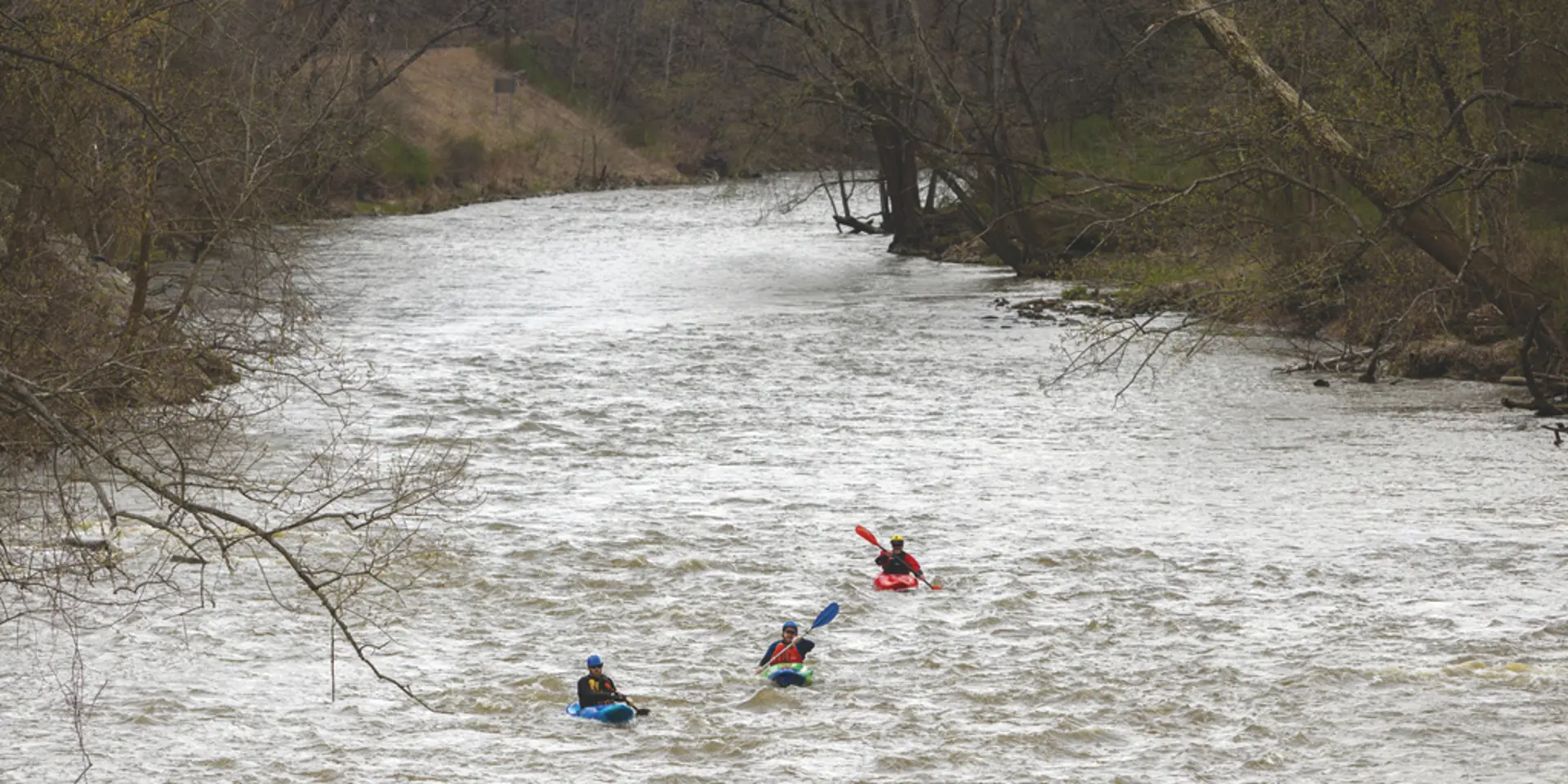 Writer Sheehan Hannan (green kayak) paddles through the Cuyahoga Valley National Park.