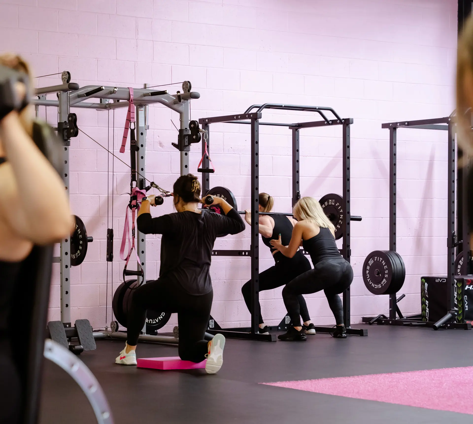 women lifting weights