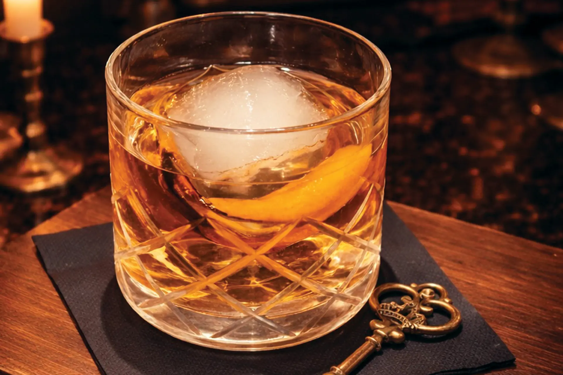 a cocktail on a bar napkin
