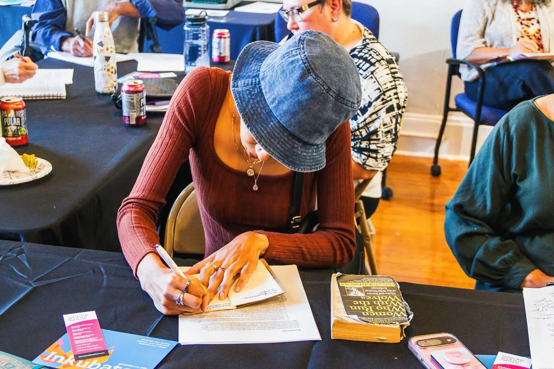 Person writing in a notebook