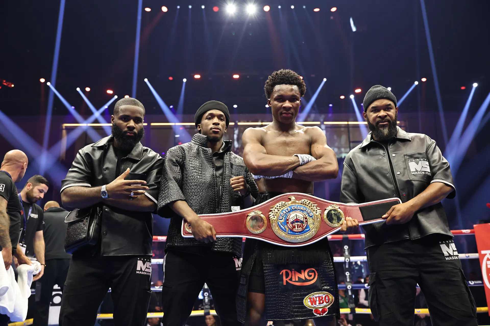 Abdullah Mason and his family with winning belt