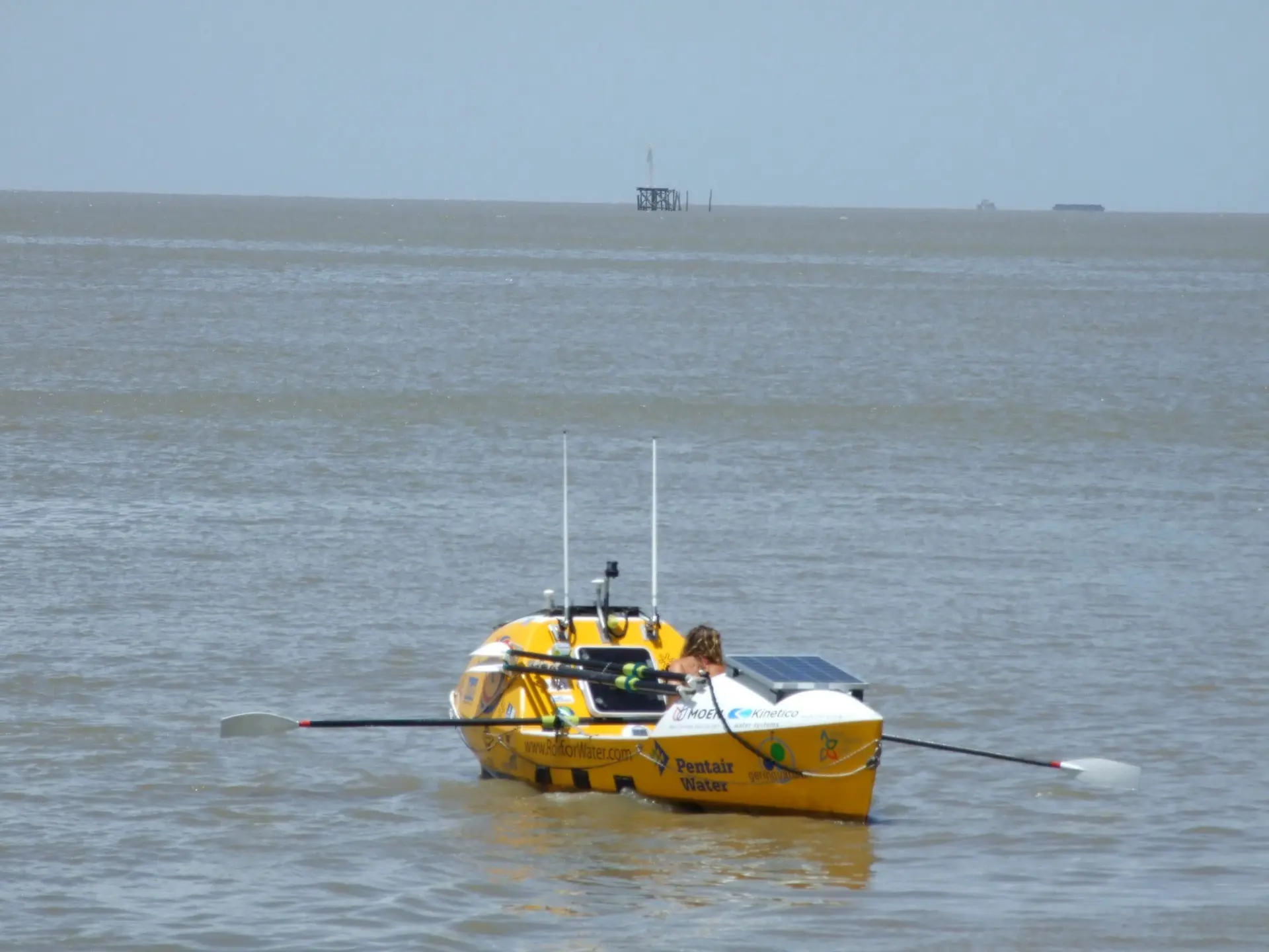 Person rowing in a boat.