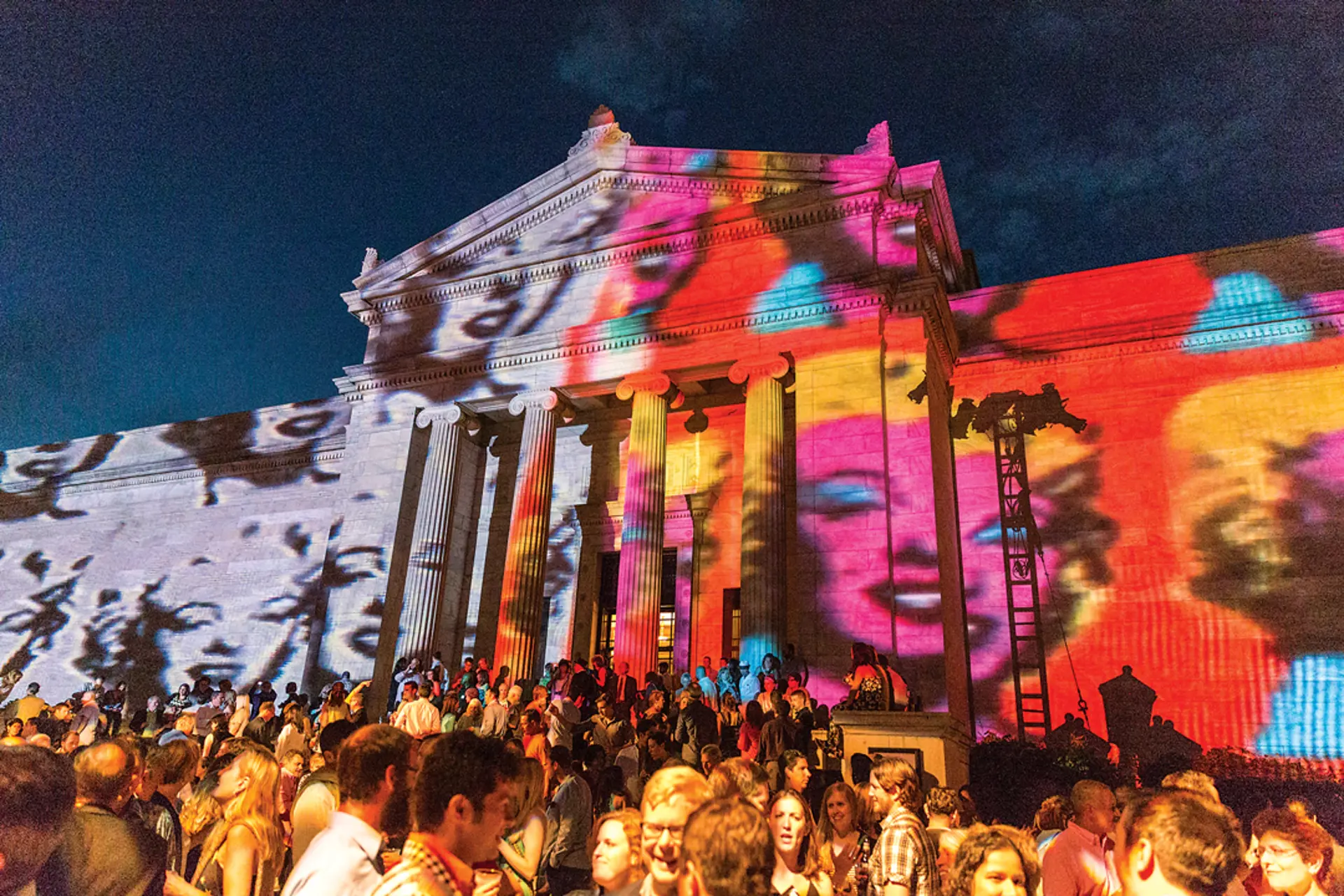 A light show projected onto the exterior of the Cleveland Museum of Art