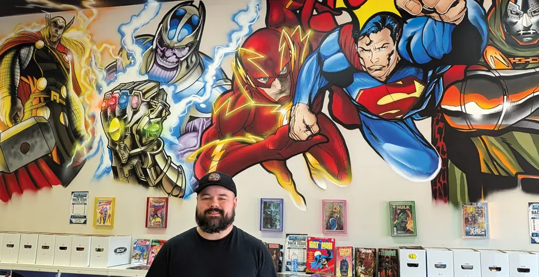 Matthew Petz inside his store, Lake Effect Comics