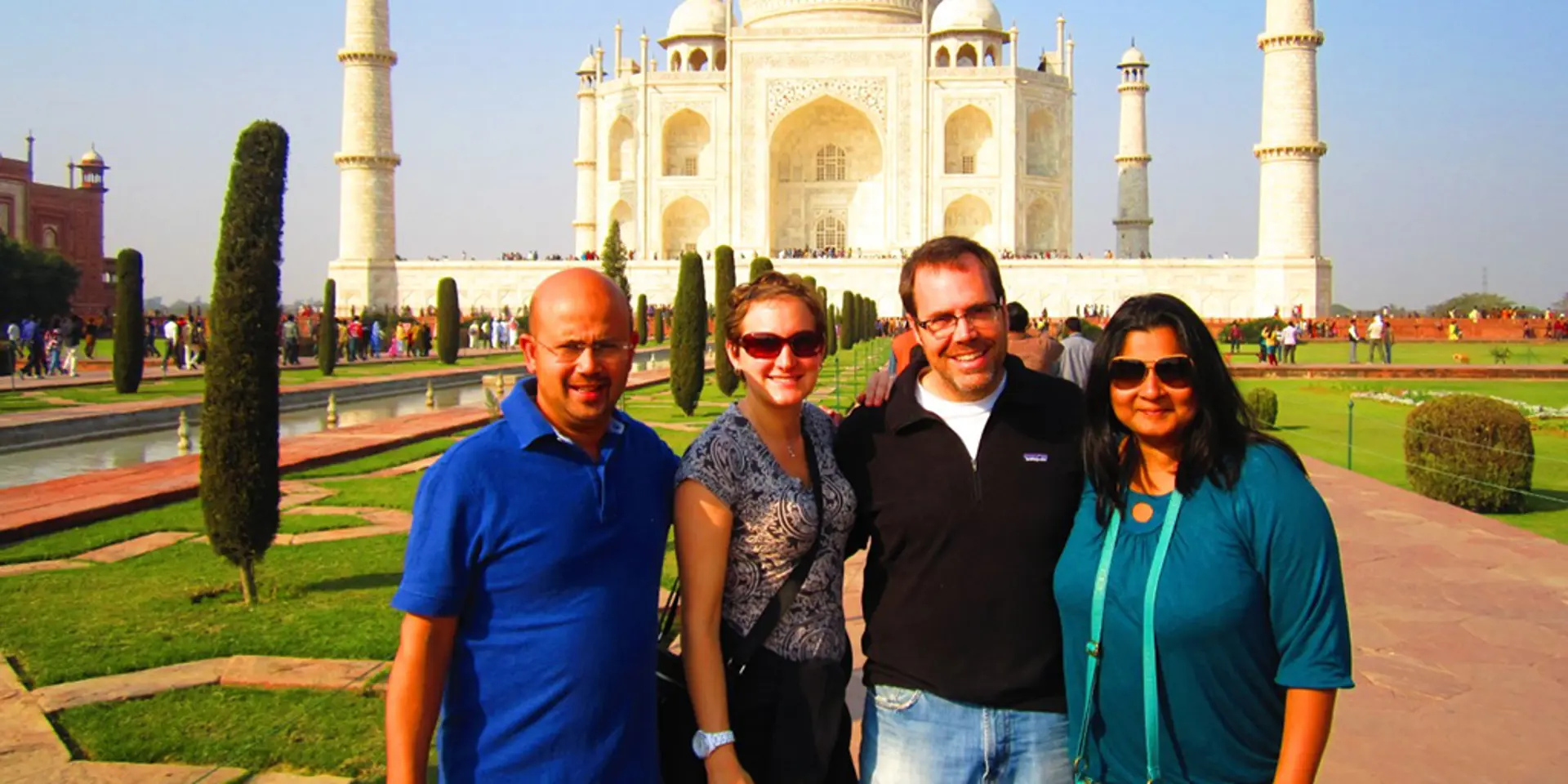 Doug Katz and other people standing in front of the Taj Mahal.