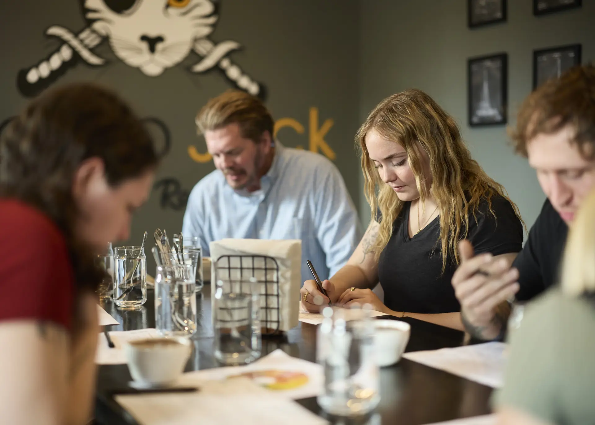 Patrons at Calico Jack Coffee's coffee cupping class