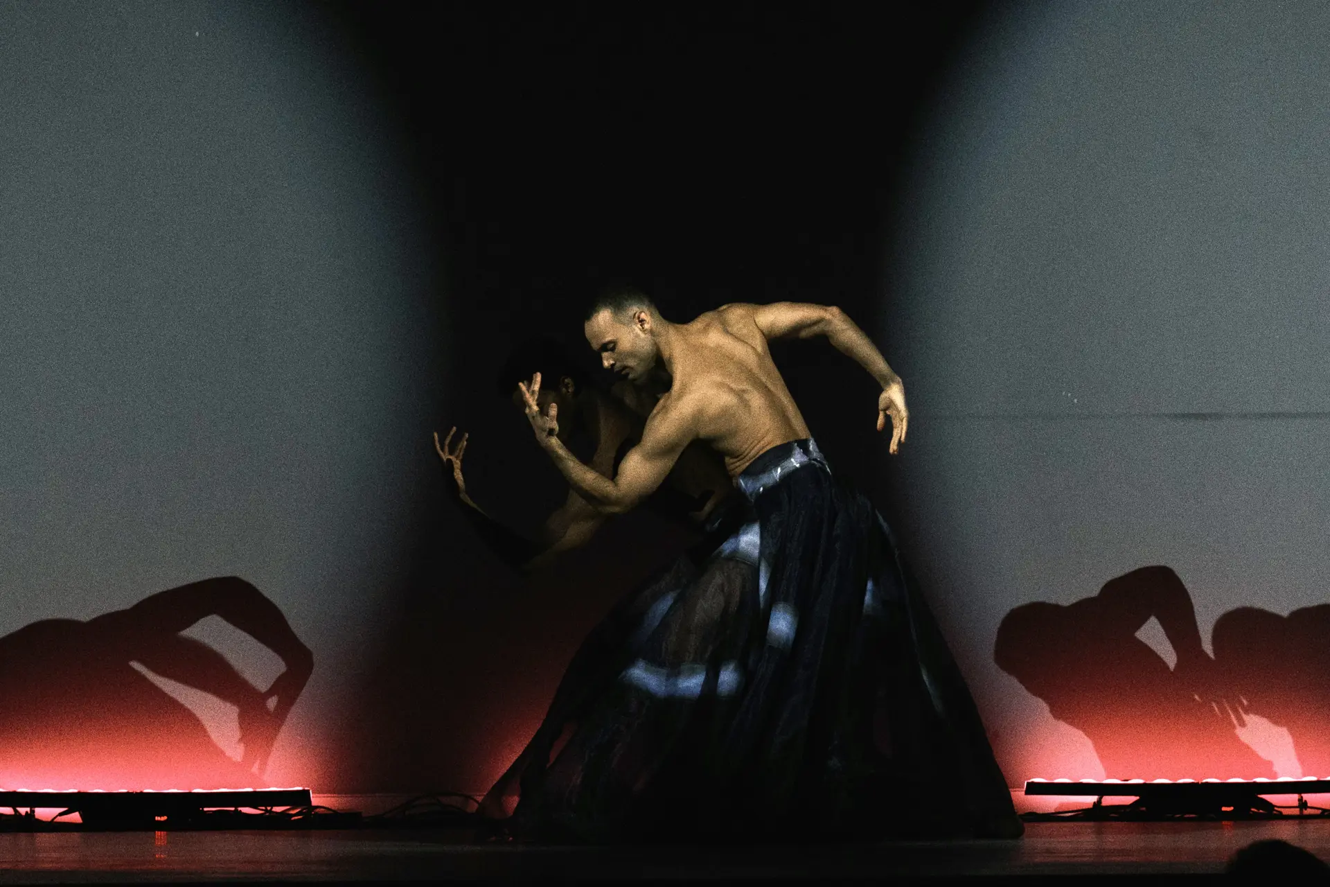 Person performing in ballet.