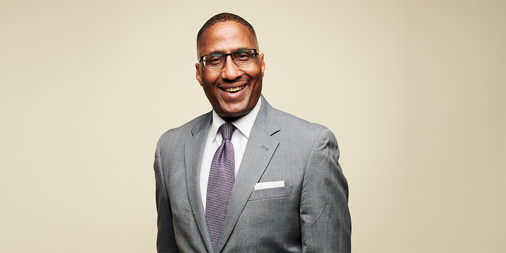 Portrait of a man in a suit.