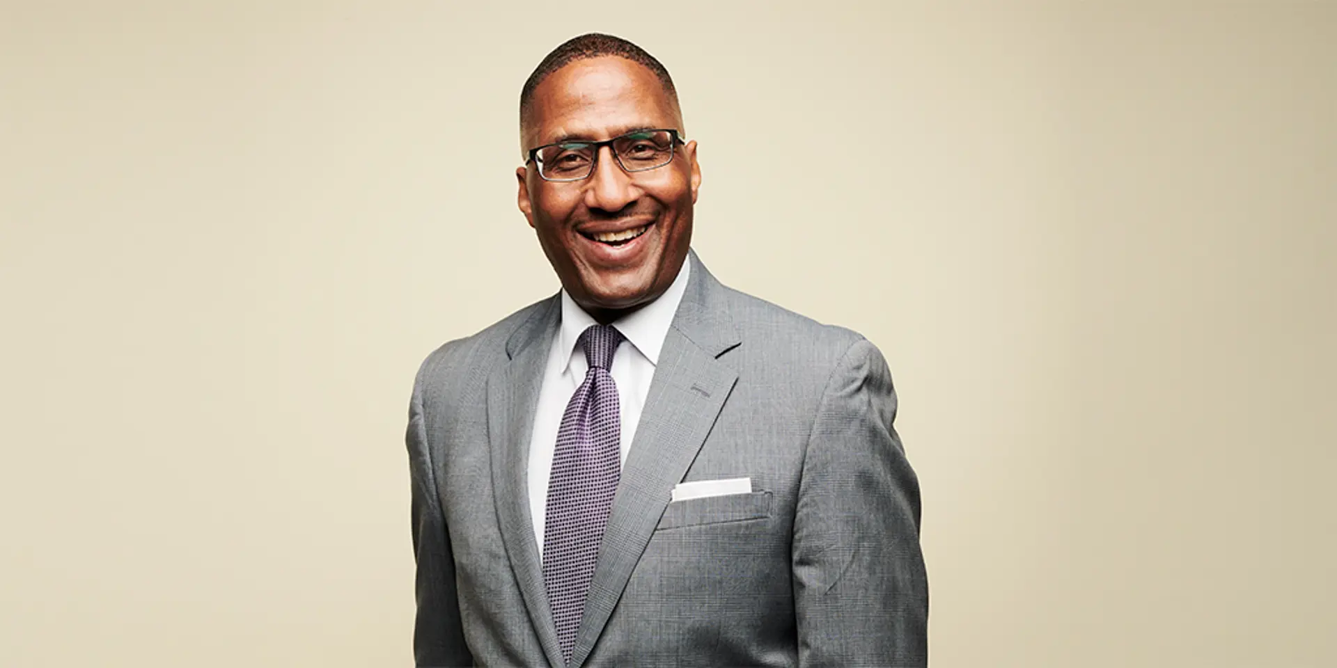 Portrait of a man in a suit.