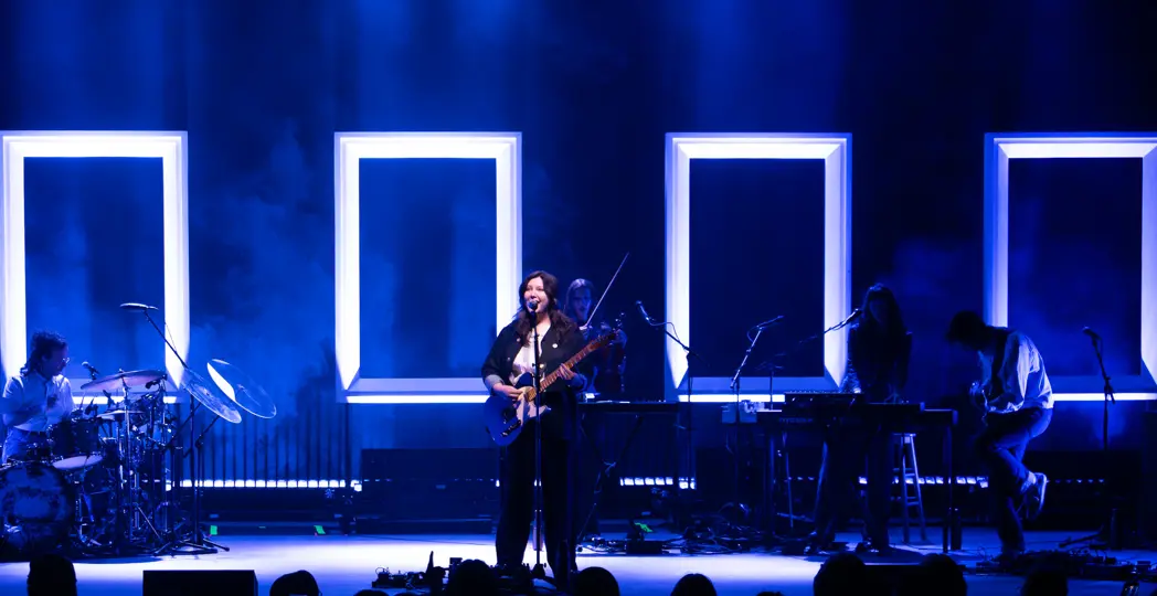 Lucy Dacus on stage with her band